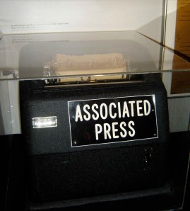 A glass case with the Associated Press teletype that was used to disseminate information at the scene of the shooting sits on a stand in the museum, a reminder of how quickly the press hustled to spread the news of JFK's assasination. 