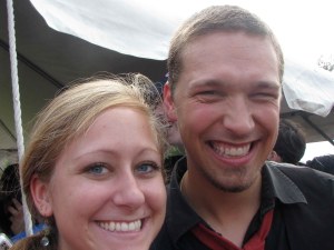 An unflattering photo of me standing next to Isaac. 