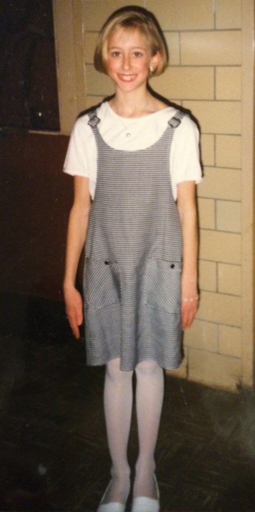 This photo was taken two days after my mom died. I was 11.